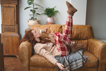 cozy afternoon relaxation with warm drink and comfy attire in a stylish living room