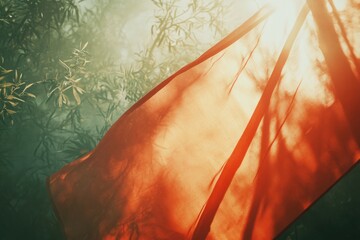 Poster - A bright red umbrella with sunlight shining through its canopy, great for sunny day scenes or adding warmth to any image