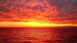 © Hasan Pixel - Nature's evening masterpiece: a serene sunset over the ocean with fiery red hues illuminating the sky, creating a peaceful afterglow as the heat of the day gives way to the calm of dusk.