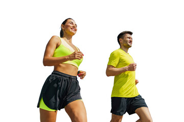 Couple Jogging Together in Bright Workout Attire Against a Clear Sky During a Sunny Afternoon