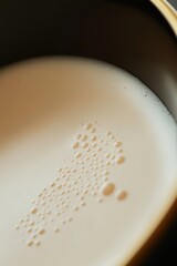 Poster - A close-up shot of a bowl filled with milk