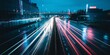© Caspernik - Colorful car light trails, long exposure photo at night, fantastic night scene, top view, a long exposure photo at the night