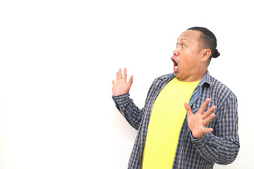 shocked face or shocked expression of an Asian man isolated on a white background