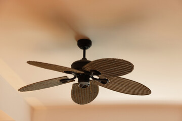 Canvas Print - Modern ceiling fan indoors, low angle view