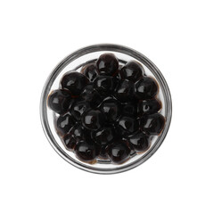 Sticker - Dark tapioca pearls in bowl isolated on white, top view