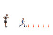 © Ljupco Smokovski - Coach whistling and a boy leading a football between obstacle cones