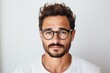 © Igor - Portrait of handsome young man in eyeglasses on grey background