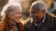 © Aziz - A senior couple smiles and looks at each other lovingly in a park.