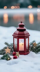 Wall Mural - A charming red lantern illuminates two candles while surrounded by shiny ornaments, pine branches, and snow, creating a cozy holiday atmosphere