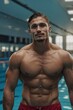 © theartofphoto - Athlete posing confidently at a swimming pool, showcasing strong physique and defined jawline during training session.