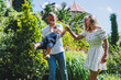 © Дмитрий Ткачук - Two parents are playing on a walk with their toddler son. A young married couple, a man, a woman and a little son, are walking in the park. Time for a walk, mom, dad and small child.