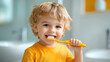 © Julia Zarubina - little boy brushing teeth in bathroom, child doing morning routine, hygiene, dental health, lifestyle, toothbrush, toothpaste, cute kid, childhood, baby, toddler, oral care