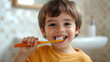 © Julia Zarubina - little boy brushing teeth in bathroom, child doing morning routine, hygiene, dental health, lifestyle, toothbrush, toothpaste, cute kid, childhood, baby, toddler, oral care
