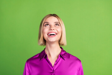 Poster - Photo of lovely cheerful girl wear trendy pink clothes look empty space isolated on green color background