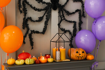 Sticker - Different Halloween decor on fireplace in room. Festive interior