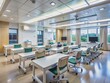 © Sandra - Modern hospital classroom with sleek furniture and advanced technology, empty chairs and desks, illuminated by natural light, ready for a medical lecture to begin.