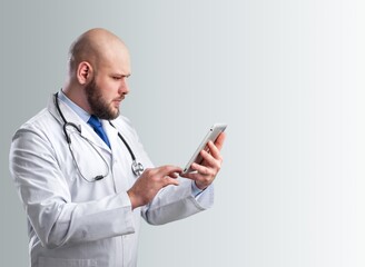 Wall Mural - Portrait of happy doctor wearing med uniform at hospital