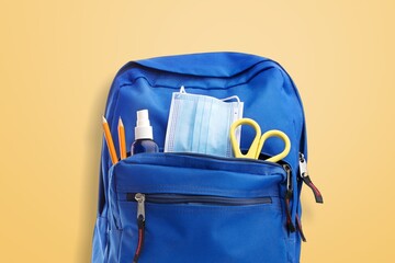 Wall Mural - School backpack containing set of supplies.