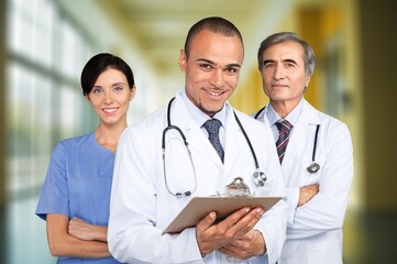 Poster - Talking nurses team in hospital background