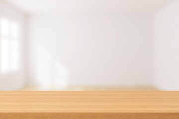 Poster - Empty space wooden table top and blur living interior background. Mockup scene display for products or texts presentation. 