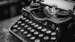 © P.G - Black-and-white close-up of a classic typewriter, with a focus on the keys and vintage paper roll.