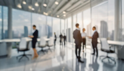 Business professionals engage in discussion during a meeting in a modern office with a city skyline view in the evening