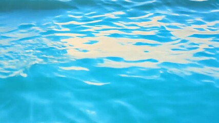Wall Mural - blue water wave surface, beautiful background with copy space. fresh drinking water, colorful video.