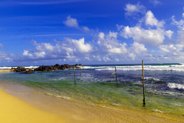 Blue sky day on a tropical beach, in Galle, Sri Lanka.