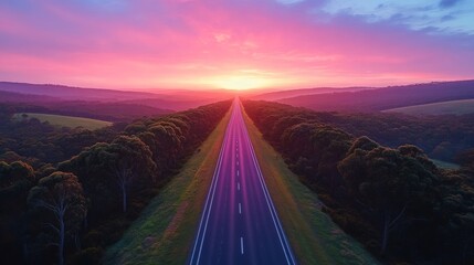 Poster - A long road with a sunset in the background