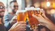 © Jose - Friends raising beer glasses in a lively pub celebration
