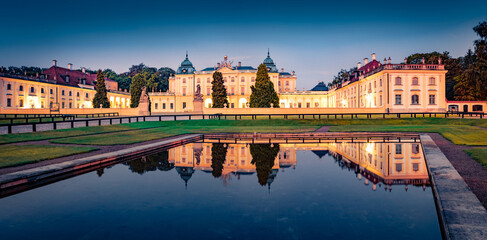 Poster - Panoramic morning view of Branicki Palace, Podlaskie Voivodeship. Illuminated summer cityscape of Bialystok - largest city in northeastern Poland. Traveling concept background..