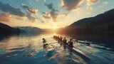 A group of rowers are rowing a boat on a lake at sunset