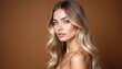 © schiers_images - Close-up portrait of a young woman with long, soft blonde hair and calm expression, set against a warm brown background.