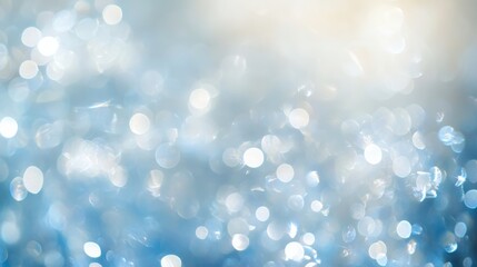 Poster - Soft-focus bokeh light background featuring a wintery Christmas theme, with gentle, sparkling lights in shades of blue and silver