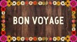 © Erlinda - bon voyage text lettering on wood background with colorful flowers on border
