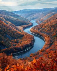 Sticker - Majestic Autumn Panorama  Winding River Flowing Through a Verdant Valley Surrounded by Vibrant Foliage Covered Hills