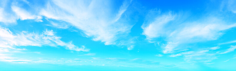 Wall Mural - blue cloudy sky on a sunny day. sky texture. abstract nature background. horizontal banner