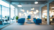 © Viewvie - Blurred image of modern office interior with bokeh lights.