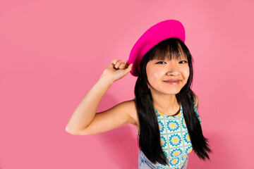 Photo of lovely cute cheerful girl wear stylish clothes headwear isolated on pink color background