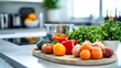 © mrbee - Fresh vegetables and fruits arranged on a cutting board in a modern kitchen, perfect for cooking and healthy meal preparation.