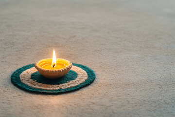 rangoli glowing with embedded led lights on a doorstep | festive decoration for diwali and celebrati