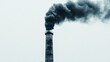 © fotogurmespb - Isolated factory chimney with dark smoke billowing out, white background, space for text, industrial air pollution representation