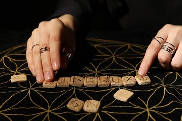 Sticker - Woman with wooden runes at divination mat, closeup