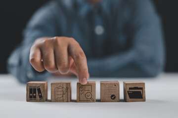Aufkleber - Human hands, wooden blocks and icons ,Concept of pre-approval quality assessment ,business accounting documents ,auditor ,management and auditing of office documents ,Reports for Tax Time Analysis