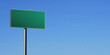 © Andres Mejia - Blank green road sign with blue sky background