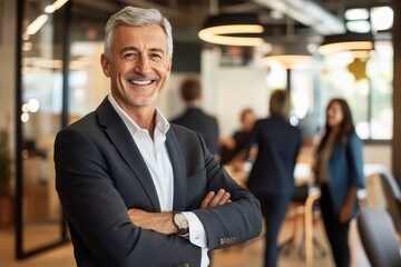 Poster - At a meeting, a mature businessman looking happy and smiling