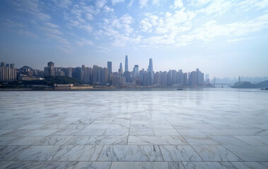 Empty marble floor with modern city skyline background