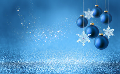 christmas tree bauble and hanging snowflake on glitter blue background with bokeh light. festive win