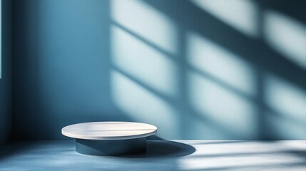 Wall Mural - a minimalist, circular podium in a blue room with sunlight streaming through a window.