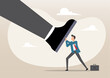 © tujuh17belas - Small employee trying to push back giant boss or competitor big feet